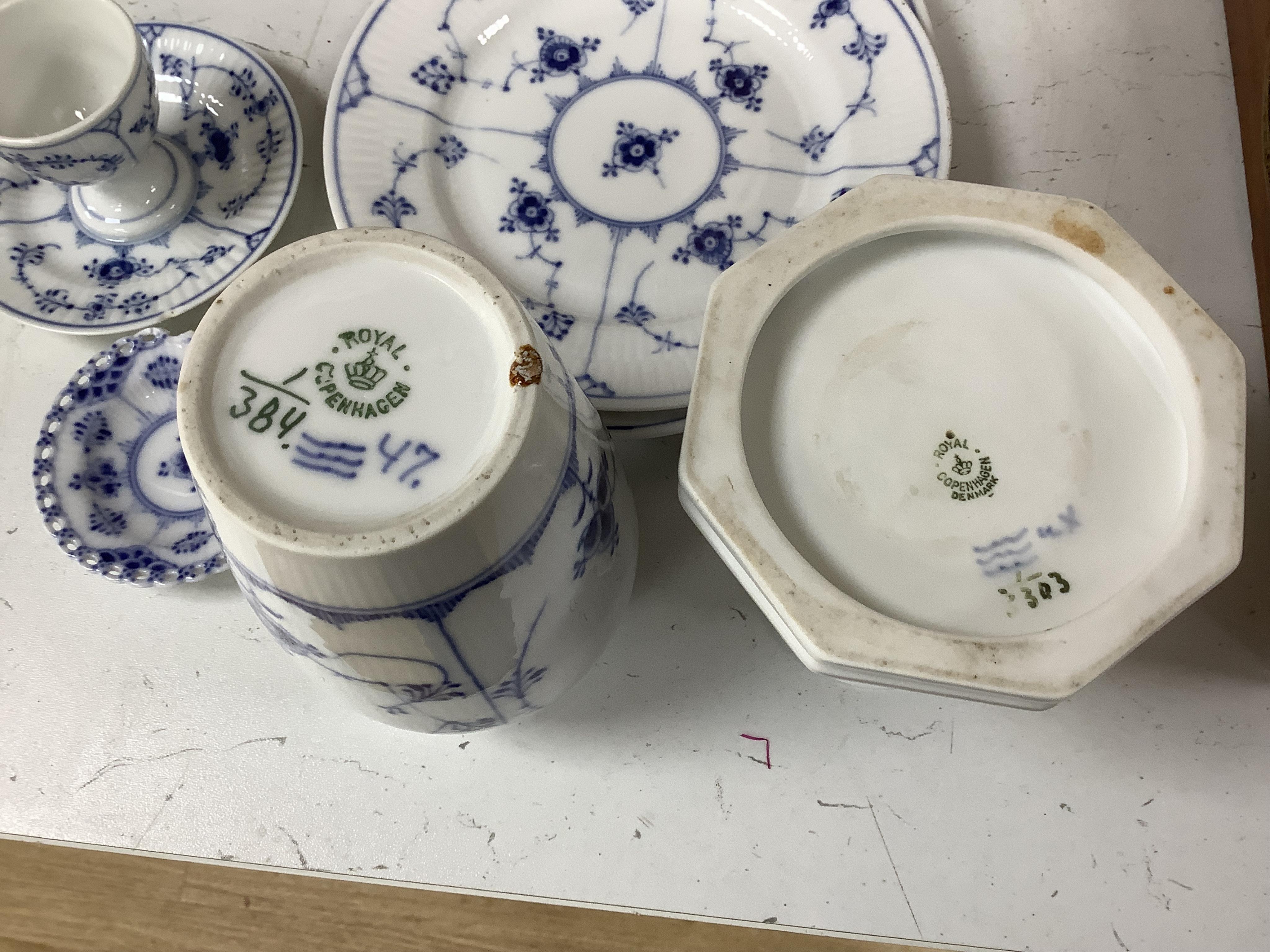 A collection of Royal Copenhagen and Bing & Grondahl onion pattern blue and white tableware